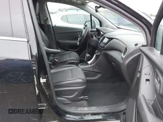 2020 Chevrolet Trax LT with VIN KL7CJLSB2LB015650, listed as a IAAI auction lot 42190979 with 64,018 mi miles and . Bid and sale history available at DreamBid. Image 5.