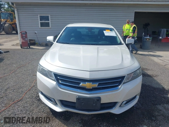 2014 Chevrolet Impala LT with VIN 1G1125S33EU101464, listed as a IAAI auction lot 41863521 with 215,270 mi miles and . Bid and sale history available at DreamBid. Image 13.