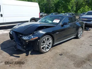 2021 Ford Mustang GT z VIN 1FA6P8CFXM5156002, wystawiony jako IAAI lot #42009222 z przebiegiem 65 939 mil mil oraz . Historia ofert i sprzedaży dostępna na DreamBid. Obrazek 17.