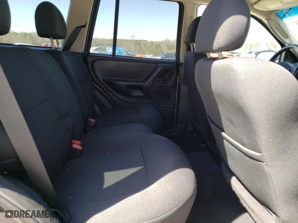 2003 Jeep Grand Cherokee Laredo with VIN 1J4GW48SX3C589100, listed as a Copart auction lot 49986745 with 247,687 mi miles and Salvage Title. Bid and sale history available at carsss.com. Image 11.