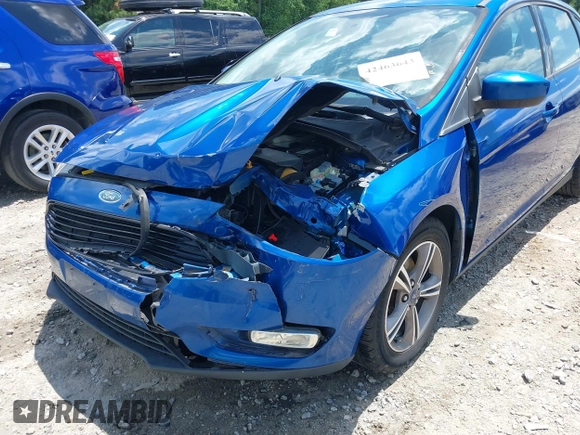 2018 Ford Focus SE with VIN 1FADP3FE8JL238024, listed as a IAAI auction lot 42463643 with Not provided miles and . Bid and sale history available at DreamBid. Image 6.