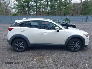 2018 Mazda CX-3 Touring with VIN JM1DKFC71J0315074, listed as a IAAI auction lot 42029790 with 100,268 mi miles. Bid and sale history available at carsss.com. Image 13.
