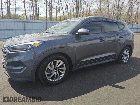 2018 Hyundai Tucson SE z VIN KM8J2CA49JU792947, wystawiony jako Copart lot #52633895 z przebiegiem 75 690 mil mil oraz Tytuł czysty. Historia ofert i sprzedaży dostępna na DreamBid. Obrazek 1.