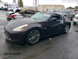 2010 Nissan 370Z Touring with VIN JN1AZ4EH6AM504310, listed as a Copart auction lot 82440524 with 0 mi miles and Salvage Title. Bid and sale history available at carsss.com. Image 1.