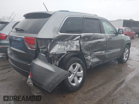 2012 Jeep Grand Cherokee Laredo with VIN 1C4RJFAG0CC156545, listed as a IAAI auction lot 41909296 with 170,033 mi miles. Bid and sale history available at carsss.com. Image 4.