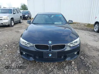 2016 BMW 4 Series 428i xDrive with VIN WBA4C9C52GG136584, listed as a IAAI auction lot 41530110 with 124,667 mi miles and . Bid and sale history available at carsss.com. Image 12.