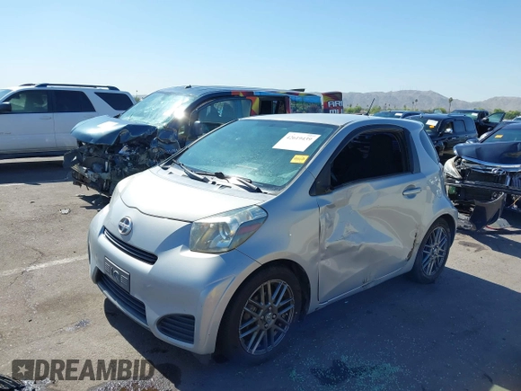 2014 Scion iQ with VIN JTNJJXB02EJ027026, listed as a IAAI auction lot 42619439 with 103,261 mi miles and . Bid and sale history available at DreamBid. Image 17.