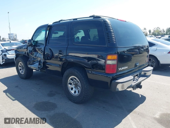 2002 GMC Yukon SLT with VIN 1GKEC13T92R162978, listed as a IAAI auction lot 41851599 with 213,789 mi miles. Bid and sale history available at carsss.com. Image 3.