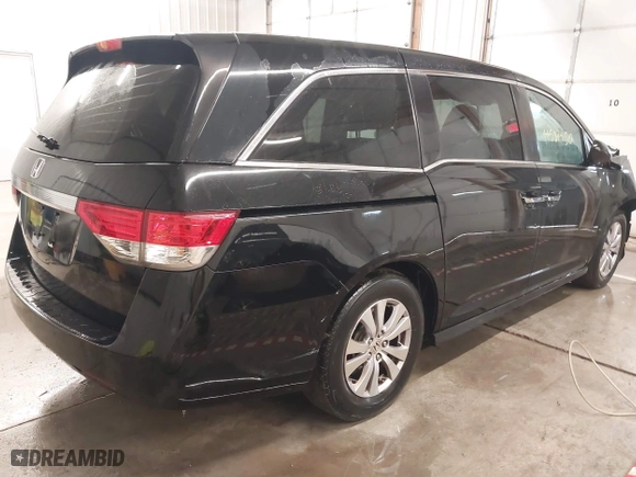 2016 Honda Odyssey EX-L with VIN 5FNRL5H61GB045982, listed as a IAAI auction lot 41587450 with 106,381 mi miles. Bid and sale history available at carsss.com. Image 4.