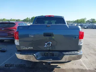 2010 Toyota Tundra with VIN 5TFEY5F11AX097360, listed as a IAAI auction lot 41990256 with 350,830 mi miles and . Bid and sale history available at DreamBid. Image 16.