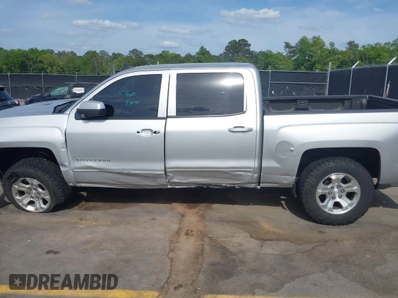 2017 Chevrolet Silverado 1500 LT with VIN 3GCUKREC5HG285689, listed as a IAAI auction lot 42055959 with 128,237 mi miles and . Bid and sale history available at DreamBid. Image 14.