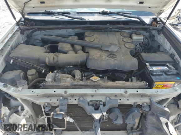 2014 Toyota 4Runner SR5 with VIN JTEZU5JR1E5077178, listed as a Copart auction lot 62014135 with 312,751 mi miles and Salvage title. Bid and sale history available at DreamBid. Image 12.