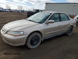 2001 Honda Accord LX z VIN 1HGCG16441A804971, wystawiony jako Copart lot #49128855 z przebiegiem 197 055 mil mil oraz Czysty tytuł • Clean title. Historia ofert i sprzedaży dostępna na DreamBid. Obrazek 1.