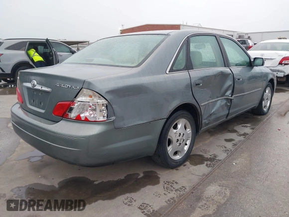 2004 Toyota Avalon XL with VIN 4T1BF28B94U387764, listed as a IAAI auction lot 42162419 with 306,611 mi miles and . Bid and sale history available at carsss.com. Image 4.
