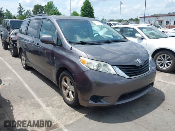 2011 Toyota Sienna LE AAS with VIN 5TDKK3DC1BS164723, listed as a IAAI auction lot 42145480 with 220,349 mi miles. Bid and sale history available at carsss.com. Image 1.