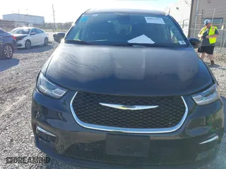2023 Chrysler Pacifica Hybrid Touring L with VIN 2C4RC1L79PR592477, listed as a IAAI auction lot 40823333 with 8,729 mi miles. Bid and sale history available at carsss.com. Image 12.