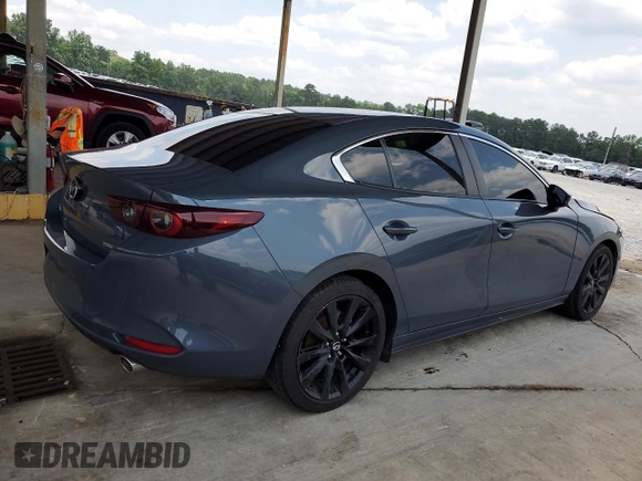 2022 Mazda 3 Carbon Edition with VIN 3MZBPACL0NM318475, listed as a Copart auction lot 59286455 with 27,327 mi miles and Salvage title. Bid and sale history available at DreamBid. Image 3.