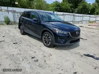 2016 Mazda CX-5 Grand Touring with VIN JM3KE4DY6G0657291, listed as a Copart auction lot 69763144 with 122,312 mi miles and Salvage Title. Bid and sale history available at carsss.com. Image 12.