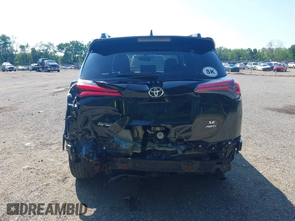 2016 Toyota RAV4 SE with VIN JTMJFREV2GJ089599, listed as a IAAI auction lot 42551300 with 90,352 mi miles and . Bid and sale history available at DreamBid. Image 17.
