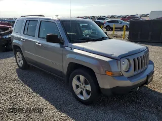 2015 Jeep Patriot Latitude with VIN 1C4NJPFB1FD157025, listed as a Copart auction lot 52310155 with 132,752 mi miles and Salvage title. Bid and sale history available at DreamBid. Image 4.