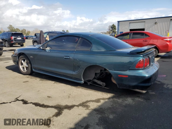 1997 Ford Mustang GT with VIN 1FALP42X0VF181072, listed as a Copart auction lot 49300975 with 193,570 mi miles and Clean title. Bid and sale history available at DreamBid. Image 2.