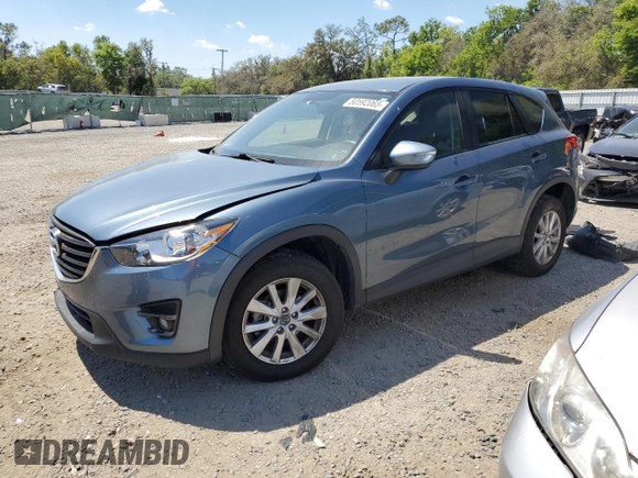2016 Mazda CX-5 Touring with VIN JM3KE2CY0G0894283, listed as a Copart auction lot 50592065 with 86,400 mi miles and Salvage Title. Bid and sale history available at carsss.com. Image 1.