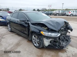 2016 Ford Fusion Titanium with VIN 3FA6P0SU4GR236009, listed as a IAAI auction lot 41219691 with 306,144 mi miles and . Bid and sale history available at DreamBid. Image 1.