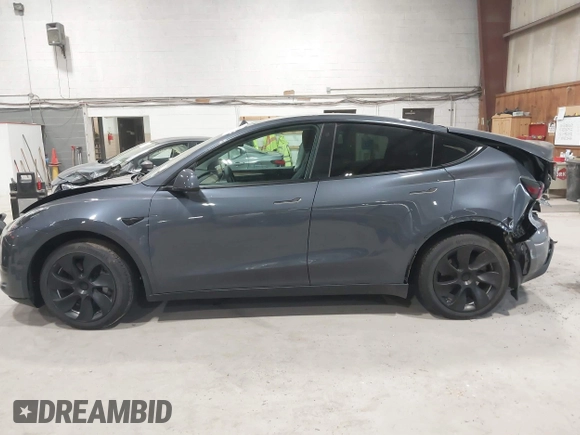 2023 Tesla Model Y Long Range with VIN 7SAYGAEE2PF755674, listed as a IAAI auction lot 41890025 with 24,783 mi miles and . Bid and sale history available at DreamBid. Image 14.