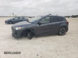 2016 Mazda CX-5 Grand Touring with VIN JM3KE2DY2G0783863, listed as a Copart auction lot 47535985 with 121,745 mi miles and Salvage Title. Bid and sale history available at carsss.com. Image 1.