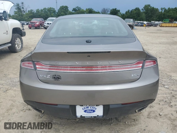 2015 Lincoln MKZ Hybrid z VIN 3LN6L2LU4FR625940, wystawiony jako Copart lot #61721025 z przebiegiem 56 151 mil mil oraz Szkoda całkowita • Salvage title. Historia ofert i sprzedaży dostępna na DreamBid. Obrazek 6.