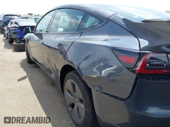 2023 Tesla Model 3 with VIN 5YJ3E1EA0PF518904, listed as a IAAI auction lot 42058540 with 20,945 mi miles and . Bid and sale history available at DreamBid. Image 19.