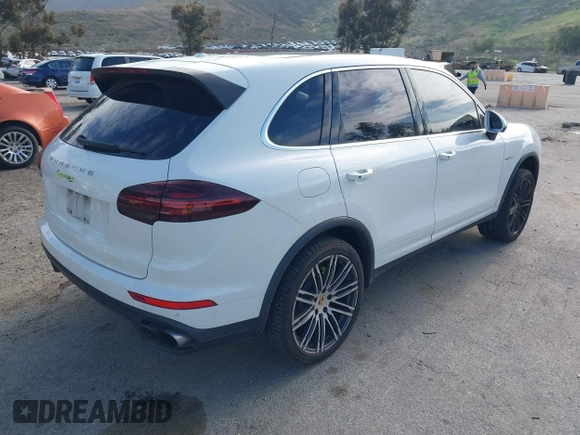 2016 Porsche Cayenne S E-Hybrid with VIN WP1AE2A25GLA58503, listed as a IAAI auction lot 41815568 with 140,635 mi miles and . Bid and sale history available at DreamBid. Image 4.