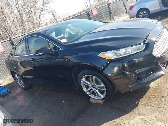 2016 Ford Fusion Energi Titanium with VIN 3FA6P0SU3GR273200, listed as a IAAI auction lot 41769899 with 152,193 mi miles. Bid and sale history available at carsss.com. Image 13.