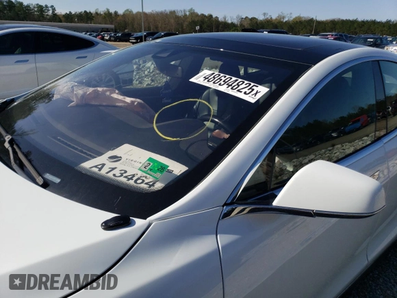 2015 Tesla Model S 85D with VIN 5YJSA1E4XFF110720, listed as a Copart auction lot 48694825 with Not Provided miles and Salvage Title. Bid and sale history available at carsss.com. Image 7.