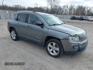 2011 Jeep Compass with VIN 1J4NF1FB1BD251618, listed as a IAAI auction lot 41633368 with 125,326 mi miles. Bid and sale history available at carsss.com. Image 1.