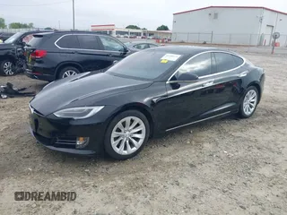 2017 Tesla Model S 60 with VIN 5YJSA1E1XHF232745, listed as a IAAI auction lot 41986834 with 89,581 mi miles and . Bid and sale history available at DreamBid. Image 2.