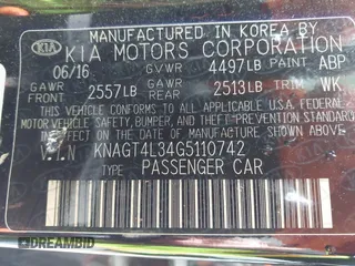 2016 Kia Optima LX with VIN KNAGT4L34G5110742, listed as a IAAI auction lot 41931969 with 128,458 mi miles. Bid and sale history available at carsss.com. Image 9.