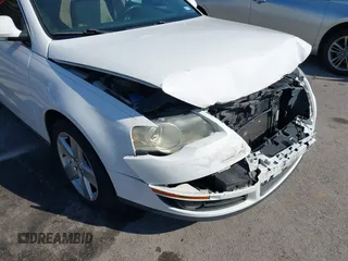 2009 Volkswagen Passat z VIN WVWJK93C29P033434, wystawiony jako IAAI lot #41698532 z przebiegiem 129 256 mil mil oraz . Historia ofert i sprzedaży dostępna na DreamBid. Obrazek 18.
