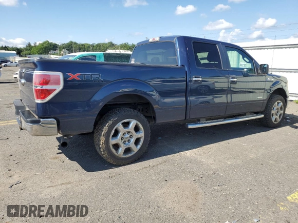 2014 Ford F-150 XL with VIN 1FTFW1ET2EFC54587, listed as a Copart auction lot 64996265 with 96,712 mi miles and Salvage title. Bid and sale history available at DreamBid. Image 3.