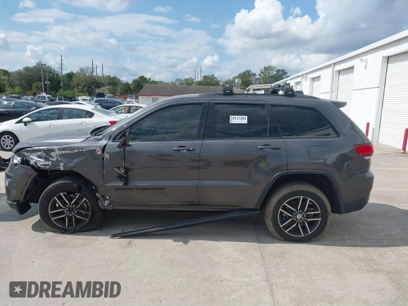 2018 Jeep Grand Cherokee Trailhawk with VIN 1C4RJFLG8JC427345, listed as a IAAI auction lot 41557222 with 49,469 mi miles and . Bid and sale history available at DreamBid. Image 14.