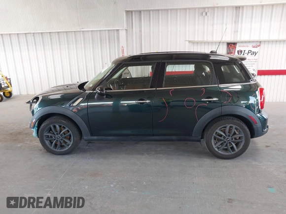 2013 MINI Countryman S with VIN WMWZC3C56DWP24170, listed as a IAAI auction lot 42366594 with 143,311 mi miles and . Bid and sale history available at DreamBid. Image 15.
