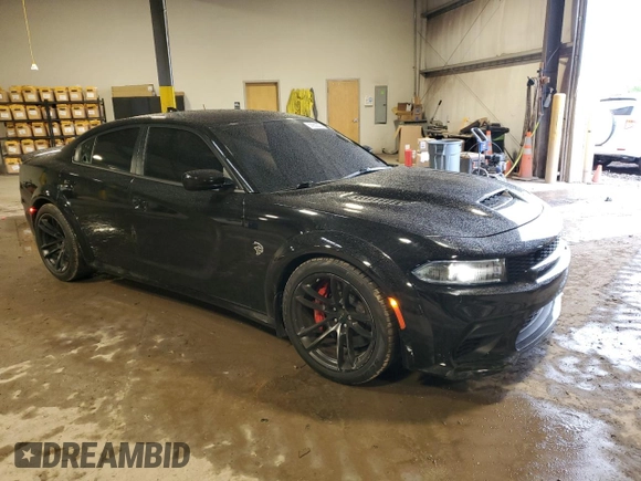 2021 Dodge Charger SRT Hellcat Widebody z VIN 2C3CDXL9XMH617917, wystawiony jako Copart lot #57069205 z przebiegiem 34 859 mil mil oraz Szkoda całkowita • Salvage title. Historia ofert i sprzedaży dostępna na DreamBid. Obrazek 4.