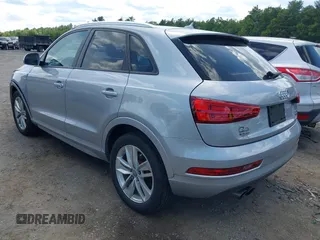 2018 Audi Q3 Premium with VIN WA1ECCFS0JR022112, listed as a IAAI auction lot 42356014 with 56,671 mi miles and . Bid and sale history available at DreamBid. Image 3.