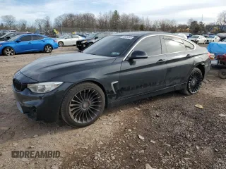 2016 BMW 4 Series 428i xDrive with VIN WBA4C9C59GG136078, listed as a Copart auction lot 49689895 with 143,135 mi miles and Salvage Title. Bid and sale history available at DreamBid. Image 1.