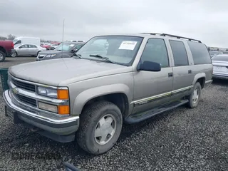 1999 Chevrolet Suburban z VIN 3GNFK16RXXG156463, wystawiony jako IAAI lot #41745169 z przebiegiem 165 541 mil mil oraz . Historia ofert i sprzedaży dostępna na DreamBid. Obrazek 2.