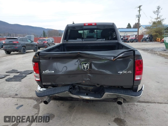 2015 Ram 1500 Big Horn z VIN 1C6RR7LT1FS520269, wystawiony jako IAAI lot #41706251 z przebiegiem 116 309 mil mil oraz . Historia ofert i sprzedaży dostępna na DreamBid. Obrazek 16.