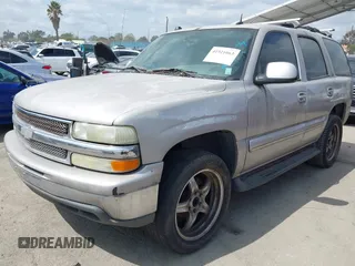 2004 Chevrolet Tahoe LS with VIN 1GNEC13T84J103666, listed as a IAAI auction lot 41921063 with 209,404 mi miles. Bid and sale history available at carsss.com. Image 2.