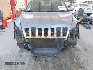 2015 Jeep Cherokee Latitude with VIN 1C4PJLCB1FW770806, listed as a IAAI auction lot 41887226 with 71,268 mi miles and . Bid and sale history available at DreamBid. Image 6.