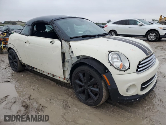 2014 MINI Cooper Coupe with VIN WMWSX1C53ET507947, listed as a Copart auction lot 42087585 with 113,068 mi miles and Salvage Title. Bid and sale history available at carsss.com. Image 4.