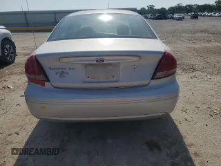 2004 Ford Taurus SE with VIN 1FAFP53U04G133586, listed as a Copart auction lot 59972925 with 228,938 mi miles and Salvage title. Bid and sale history available at DreamBid. Image 6.